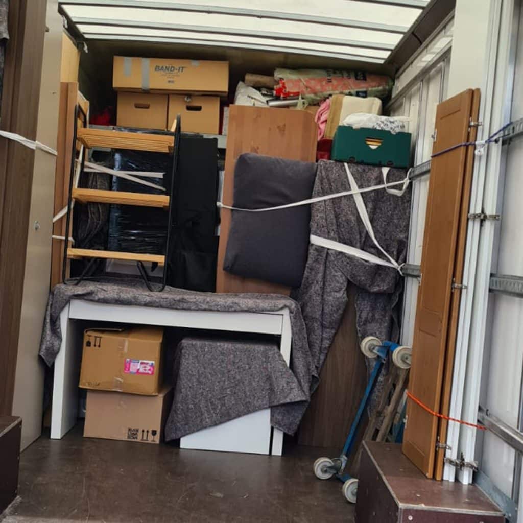 Hodsons Removals packing furniture into the van for seamless house removals in West Bridgford.